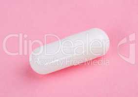 White Pill on Pink Background