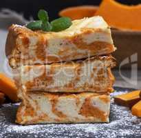 stack of square pieces of cheesecake with pumpkin