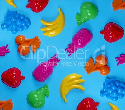 blue background with childrens colorful toys