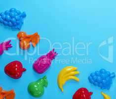 blue background with childrens colorful toys