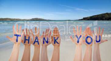 Many Hands Building Word Thank You, Beach And Ocean