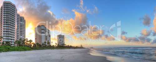 Sunrise over the white sand of Vanderbilt Beach in Naples