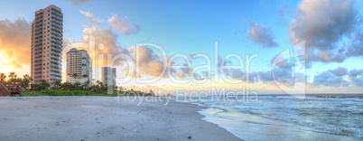 Sunrise over the white sand of Vanderbilt Beach in Naples