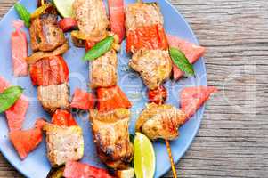 Shish kebab with watermelon garnish