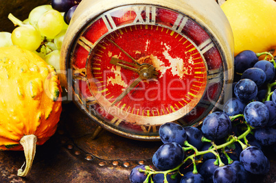 Beautiful autumn harvest and clock