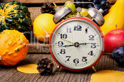 Beautiful autumn harvest and clock