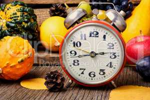 Beautiful autumn harvest and clock