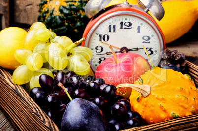 Beautiful autumn harvest and clock