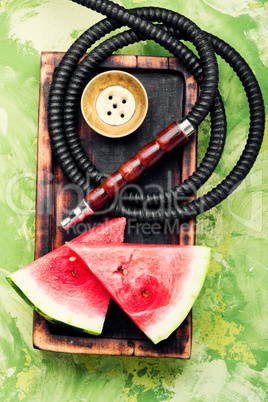 Stylish retro hookah with watermelon flavor