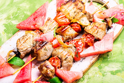 Shish kebab with watermelon garnish