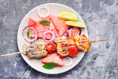 Shish kebab with watermelon garnish