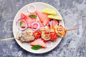 Shish kebab with watermelon garnish