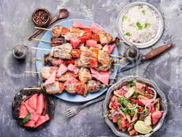 Shish kebab with watermelon garnish