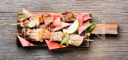 Shish kebab with watermelon garnish