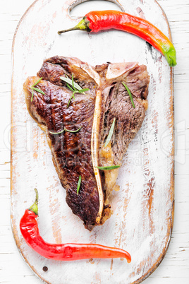 Sirloin steak on cutting board