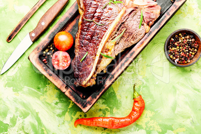 Sirloin steak on cutting board