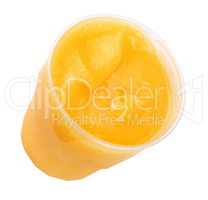 yellow honey in plastic figured container isolated on white back