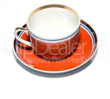 red cup with saucer
