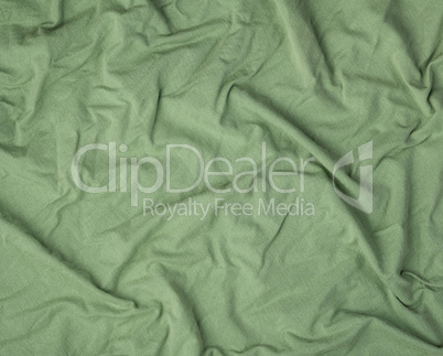 green crumpled soft fabric, full frame