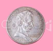 half dollar coin isolated on pink background