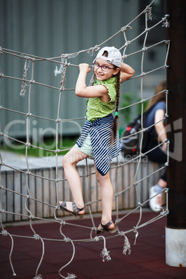 Child on climbing frame