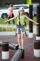 Child girl balancing