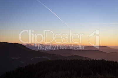 Sunset over Black Forest with blue sky