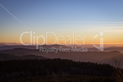 Sunset over Black Forest with blue sky