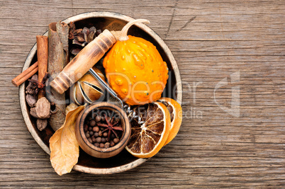 Ingredients for mulled wine on rustic background