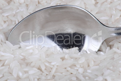 rice background and teaspoon