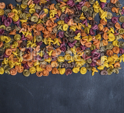unprepared pasta multicolored spiral fusilli