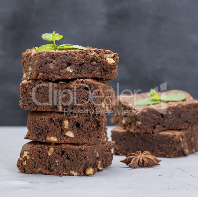 stack of square pieces of chocolate brownie cake