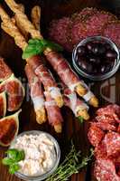 antipasti platter on wooden surface