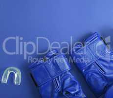 blue leather boxing gloves and silicone cap for teeth