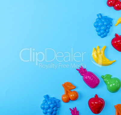 multicolored plastic toys fruits