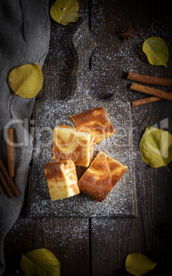 square pieces of cheesecake with pumpkin