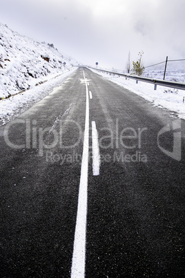 Snowy mountain road in winter