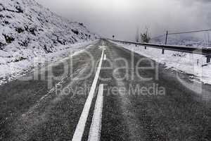 Snowy mountain road in winter