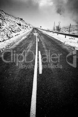 Snowy mountain road in winter