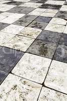 Old floor with chess squares