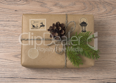 Christmas or New Year gift boxes wrapped in kraft paper with fir