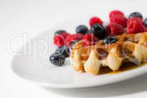 Close-up of waffles with berries