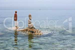 Rocks balanced on the sea