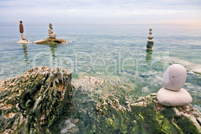 Zen balanced stones on the sea