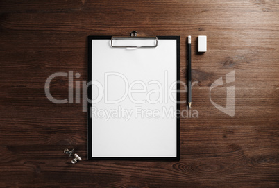 Clipboard, letterhead, pencil, eraser