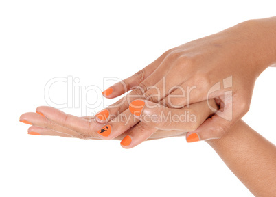 The hands of a young woman holding tight