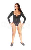 Slim beautiful woman standing in black bodysuit