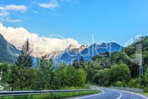 Road in the forest in the Austrian Alps