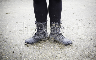 Women boots in the mud