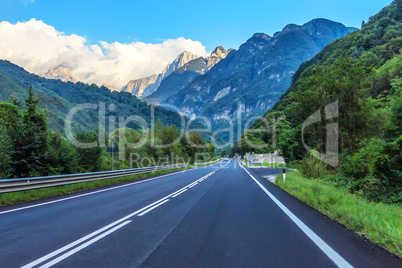 Empty road high in the Alpine mountains